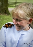 Young girl and Monarch butterfly