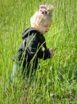 Young girl in tall grass